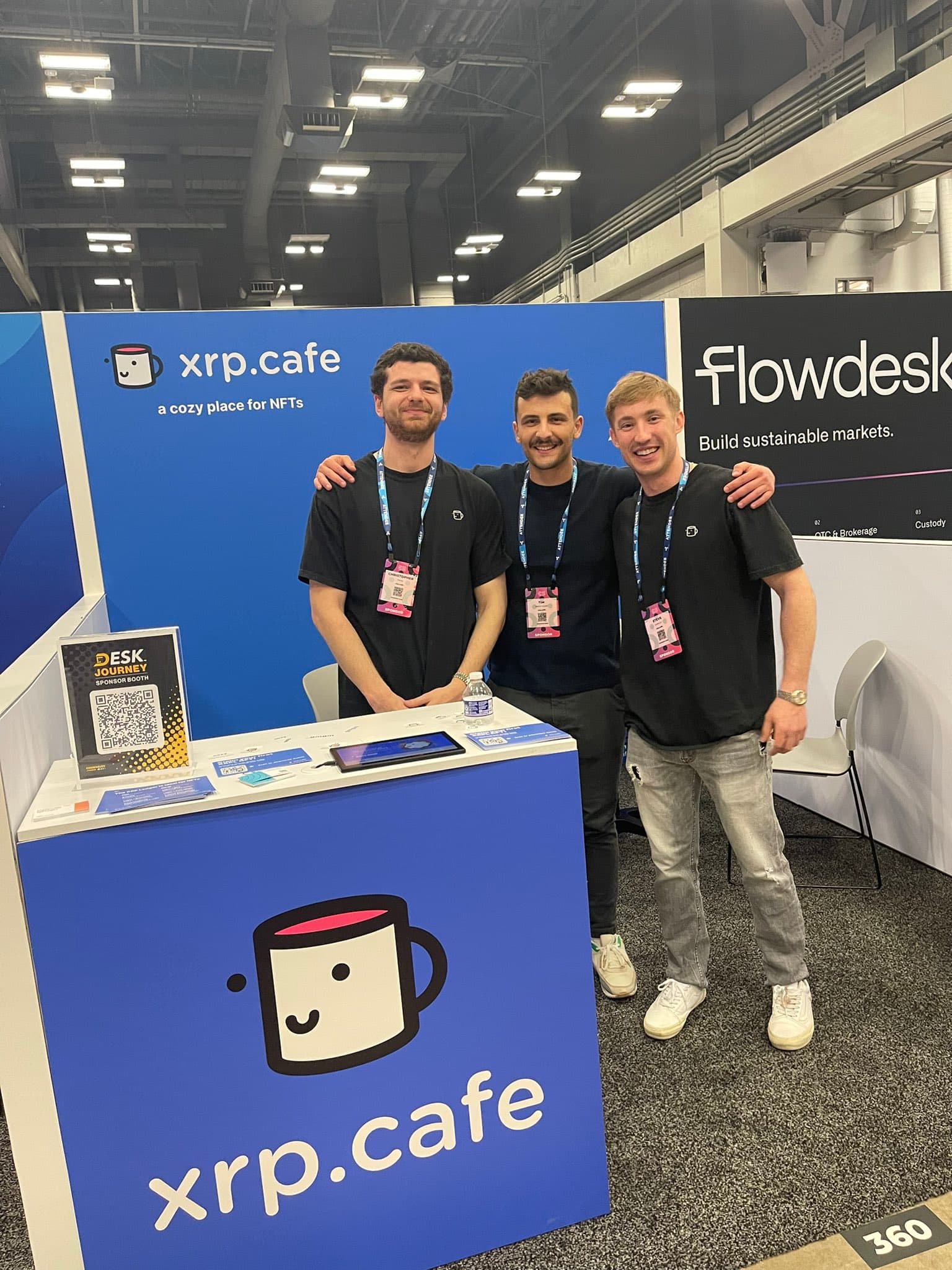 xrp.cafe team at Consensus booth