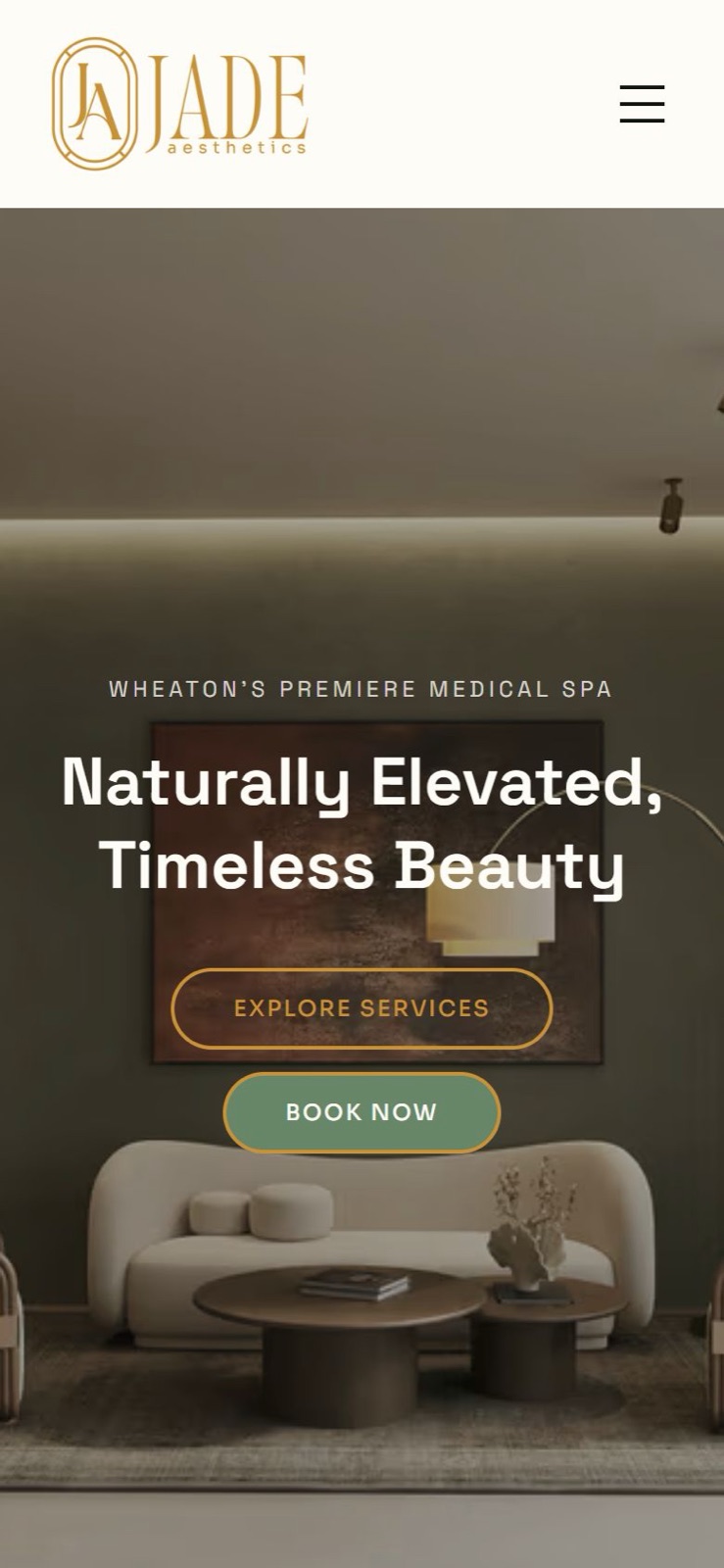 The homepage on a phone: the wordmark, the hamburger, and the hero headline over the lounge