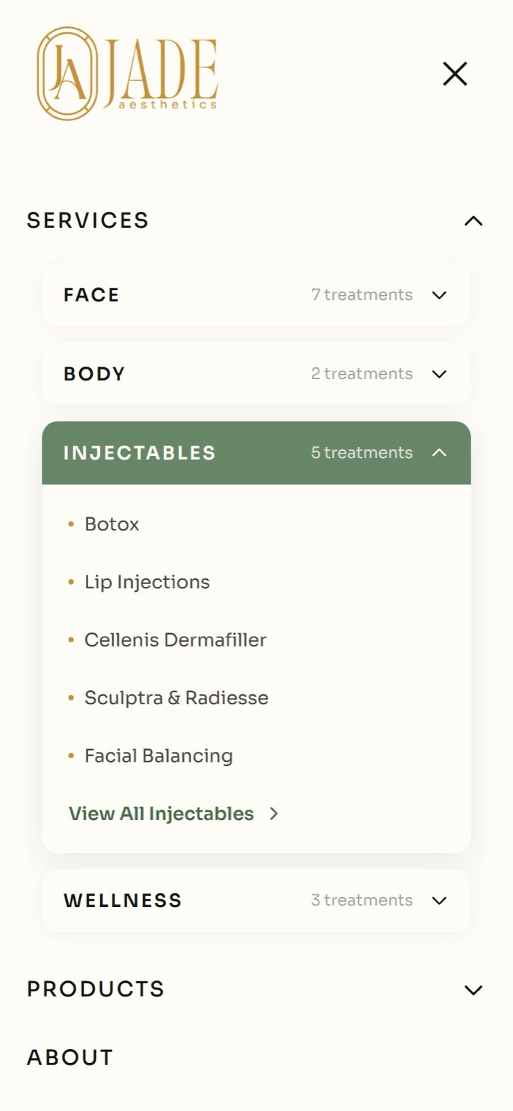 The mobile menu open: Services expanded to Face, Body, Injectables, and Wellness